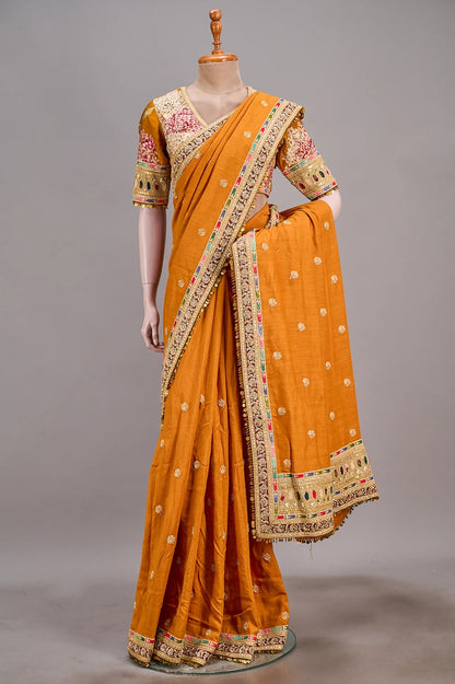 Vellotis Mustard Orange Silk Saree with Embroidered Border – Festive & Party Wear